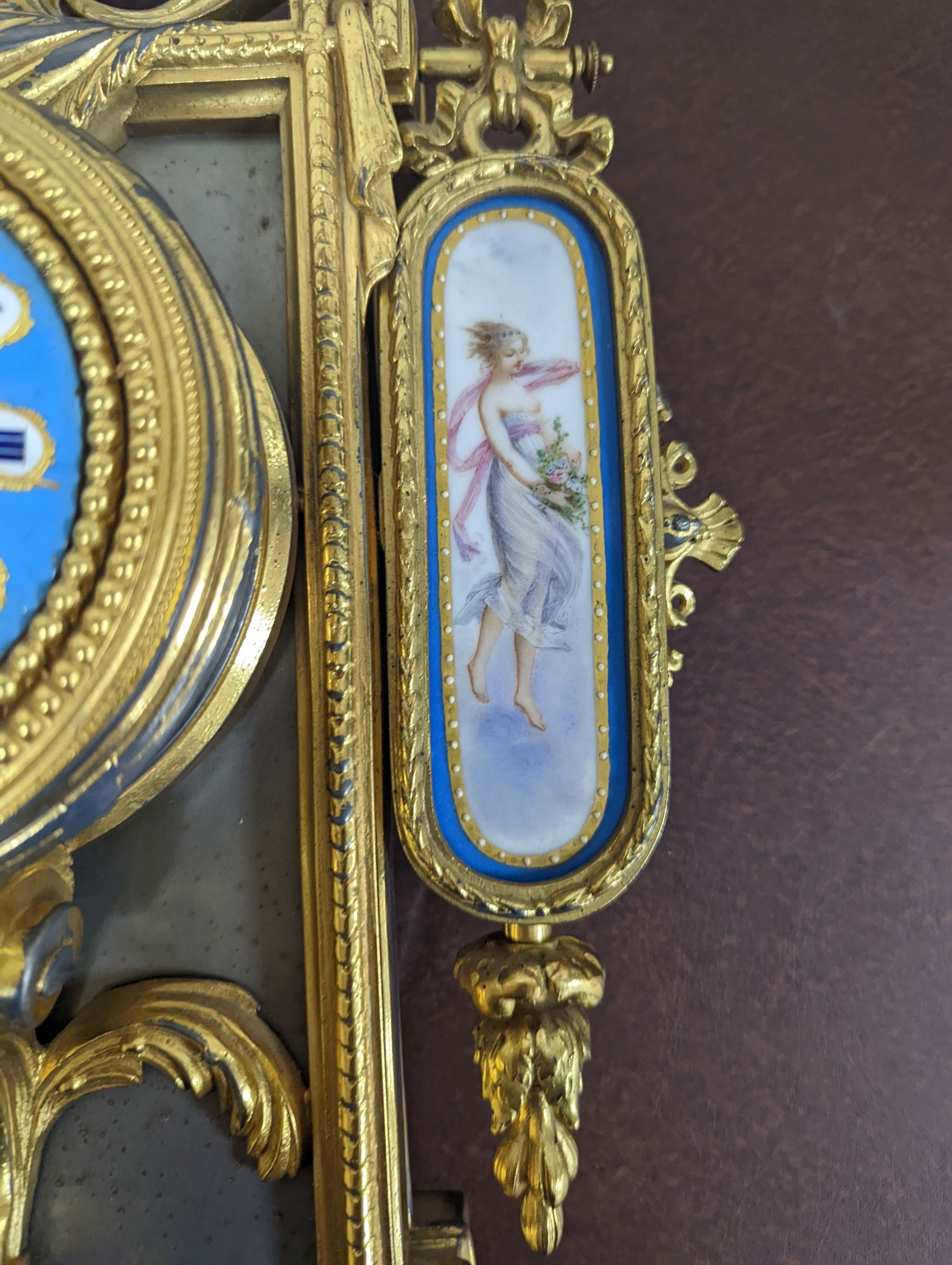 An early 20th century Sevres style wall clock 58cm